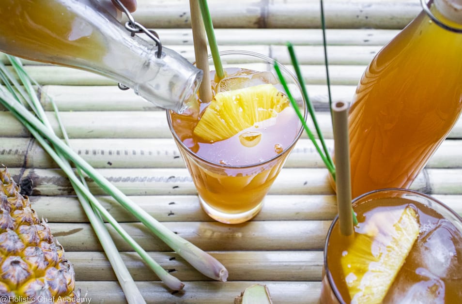 pouring pineapple tepache