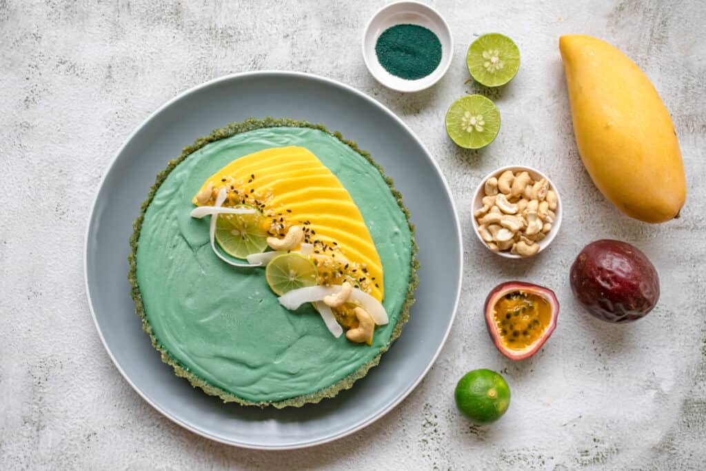key-lime-pie-garnished-with-mango-passion-fruit-and-coconut