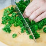 chopping fresh parsley to add to tabbouleh