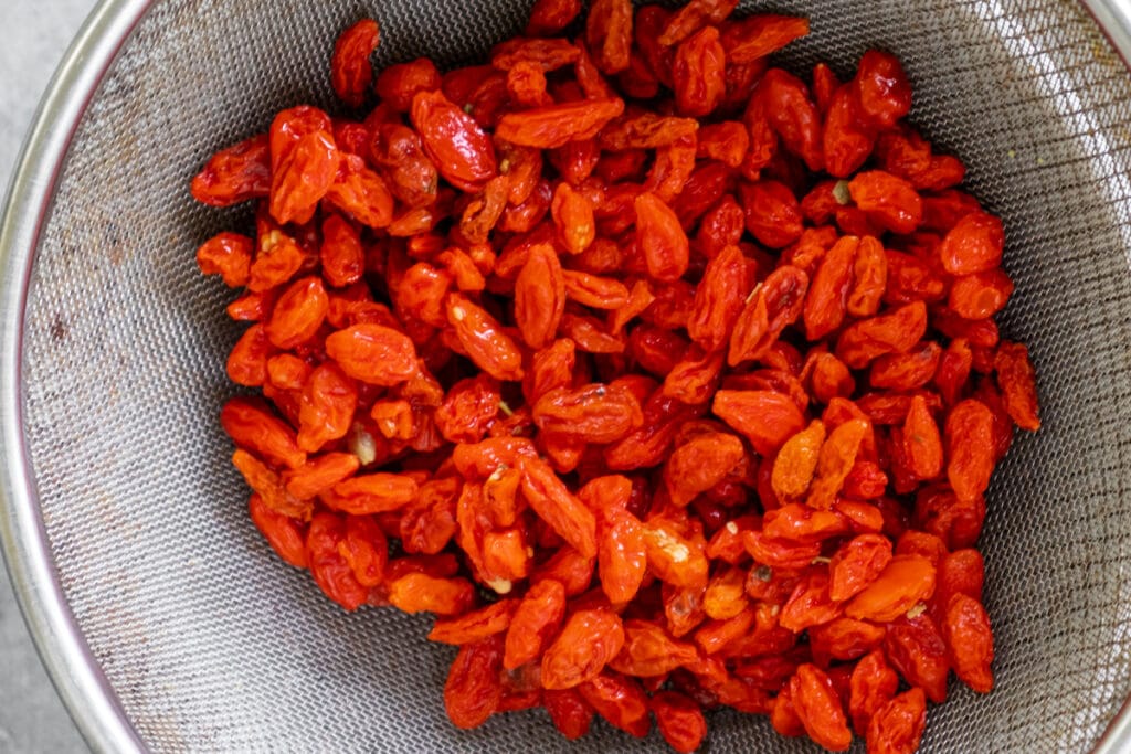 draining-goji-berries-over-a-strainer